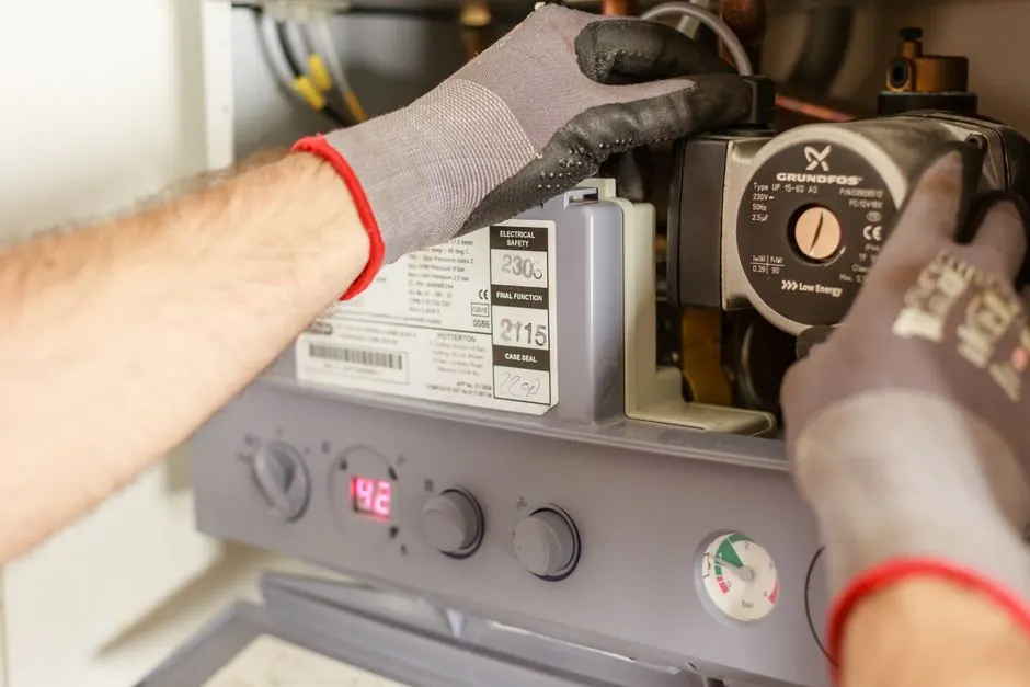 Technician performing scheduled drain maintenance in Rowlett TX